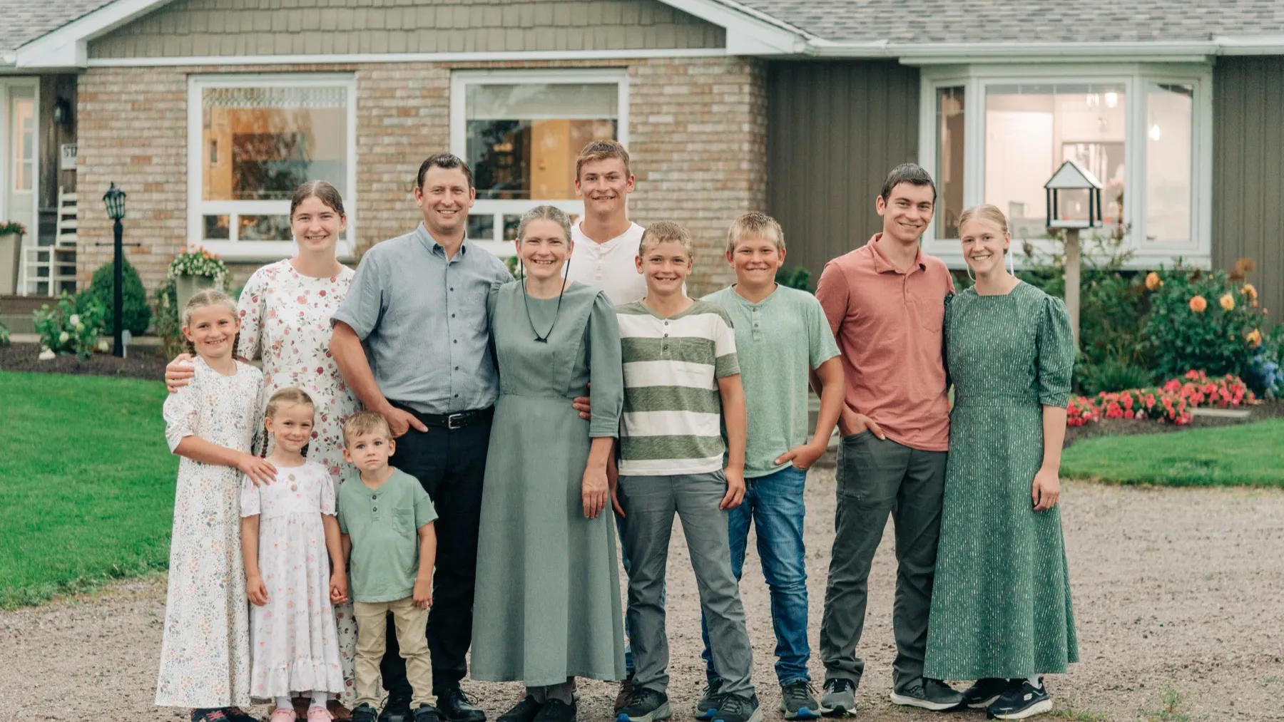 Matthew and Rhonda Martin with their family outside the farm